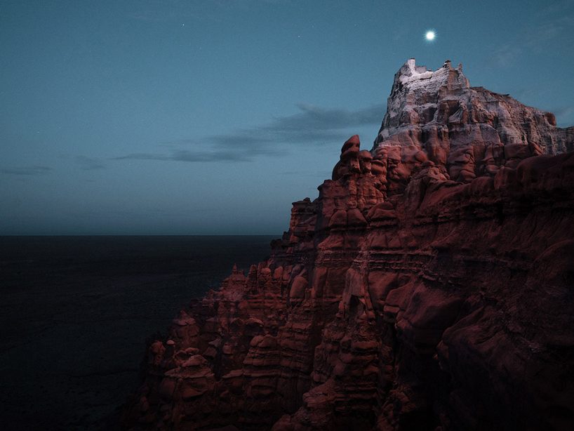 drone light paths above mountains captured in long exposure photography