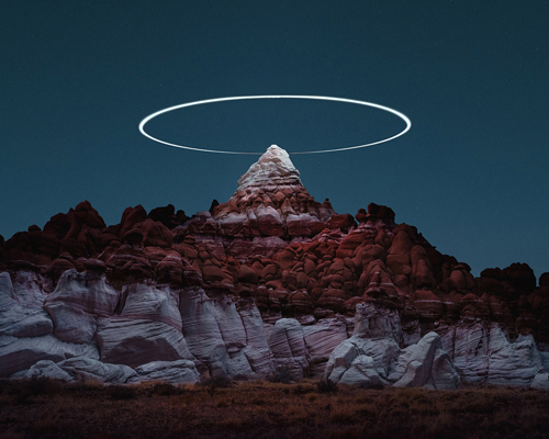 drone light paths above mountains captured in long exposure photography