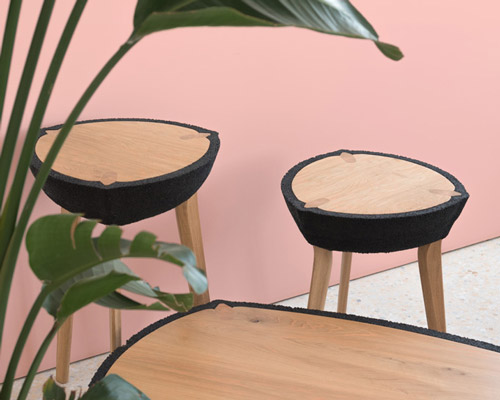 ammar kalo wraps white oak in black rubber for latest table series