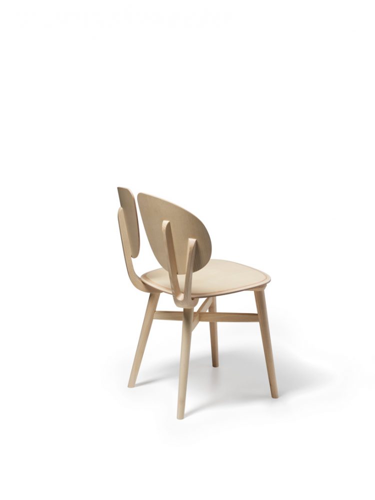 michele de lucchi designs filla chair with split leaf-like backrest for very wood