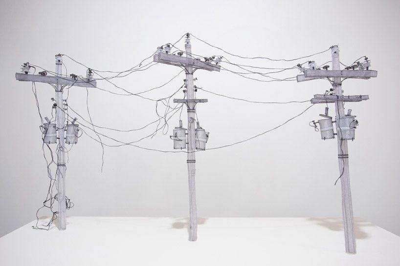 full-scale demolished car constructed from ghost-like textiles by jannick deslauriers