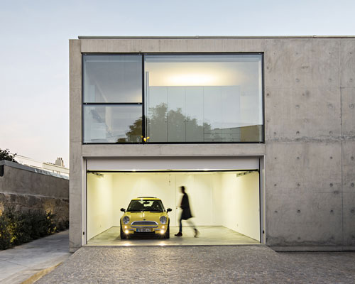 joão vieira de campos sculpts sleek concrete home in porto