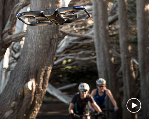 autonomous selfie drone tracks users while freely navigating the environment