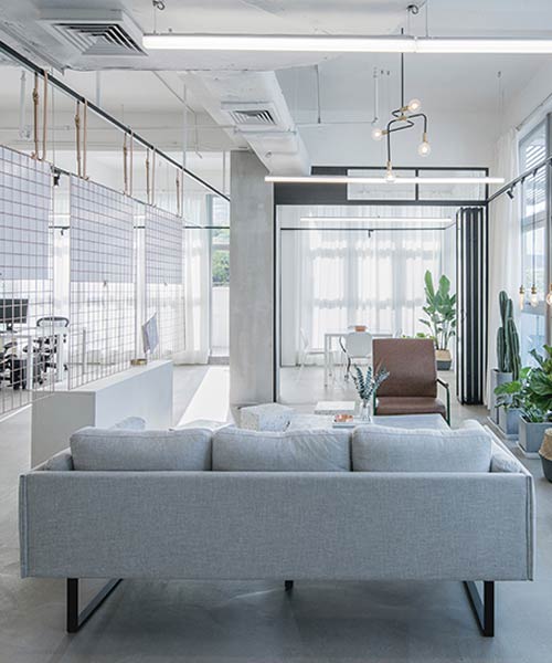 studio 10's office marries transparency and privacy in minimalist harmony
