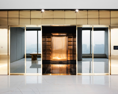 superimpose designs an exclusive wine cellar atop genesis beijing's office tower