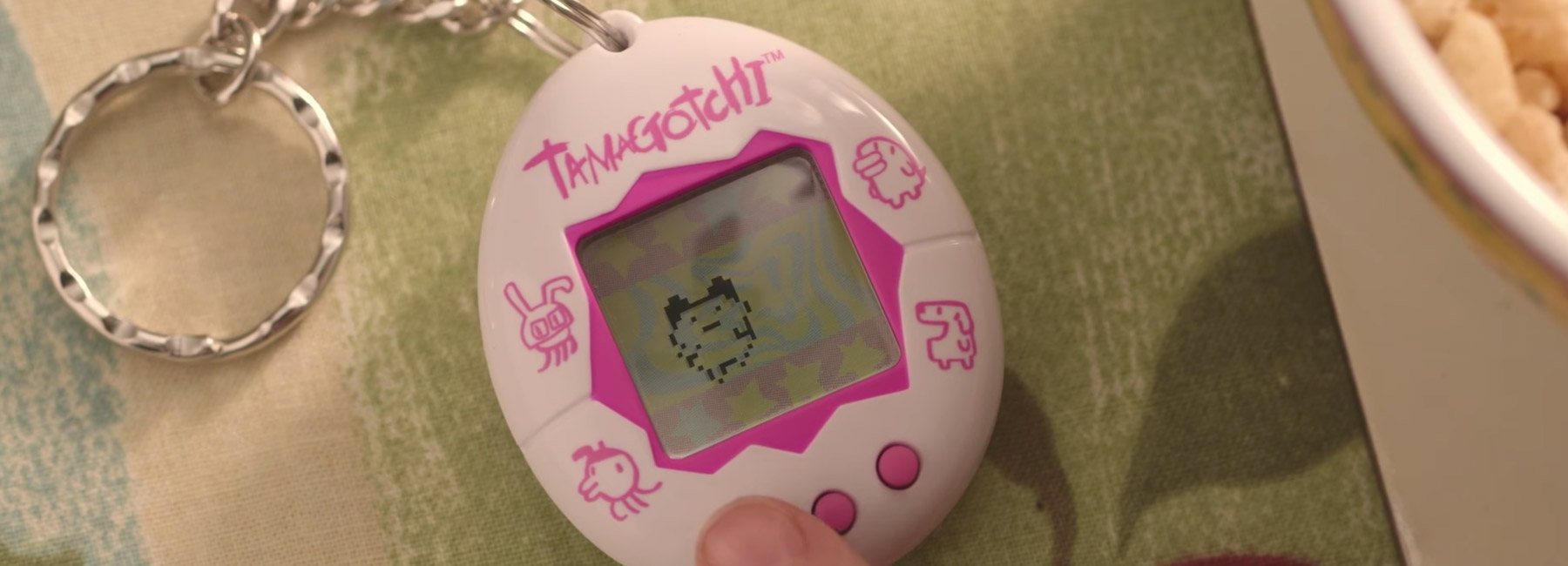 tamagotchis are back to bug you on your mobile...and they still poo alot