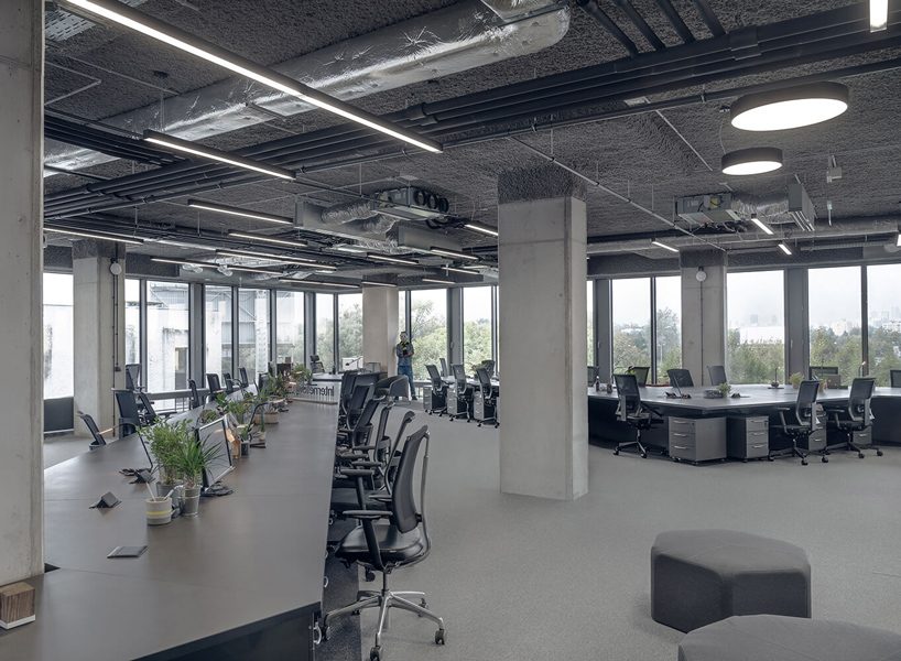 KOS architects' latest design is a spatially opened and flexible workstation in poland