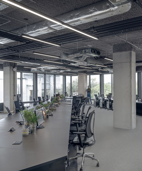KOS architects' latest design is a spatially opened and flexible workstation in poland