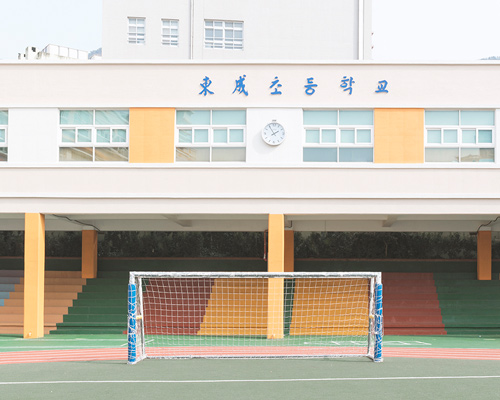 andres gallardo's photographs of korean schoolyards are pastel perfections