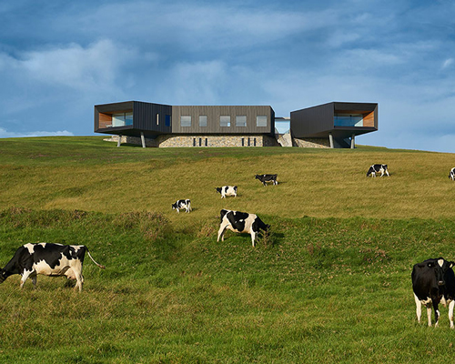 australian beach house creates farmland sanctuary from wild ocean surroundings
