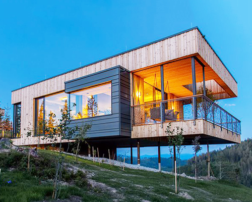 deluxe mountain chalets with fantastic view across an austrian valley, by viereck