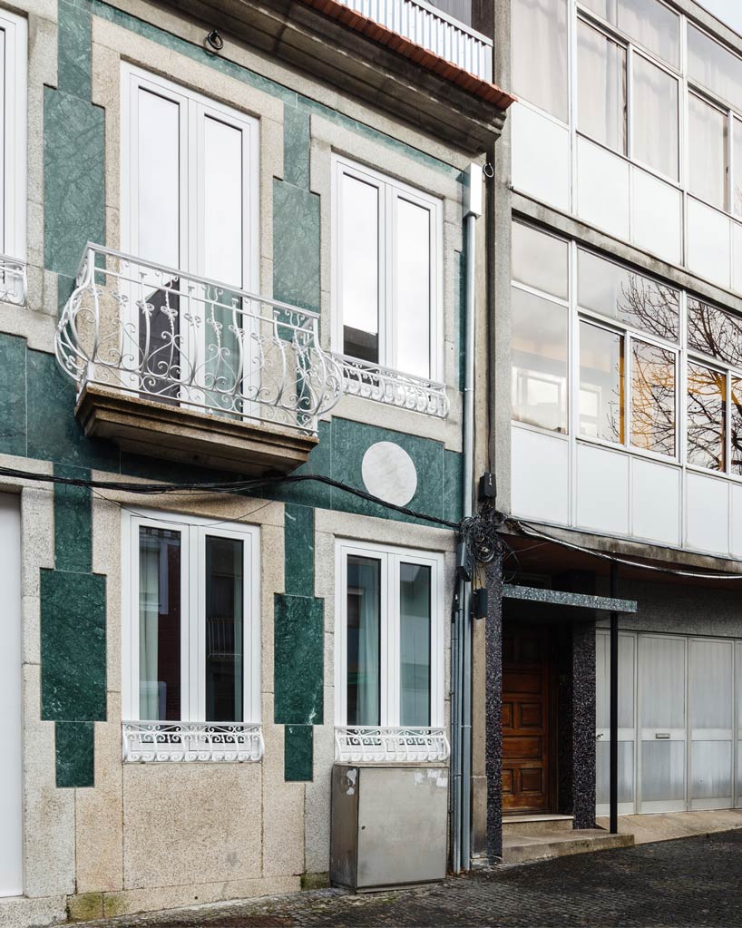 fala atelier's house in rua do paraíso is covered with marble stripes