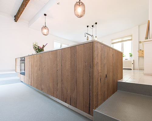refurbished townhouse in the hague by bloot features sunken kitchen