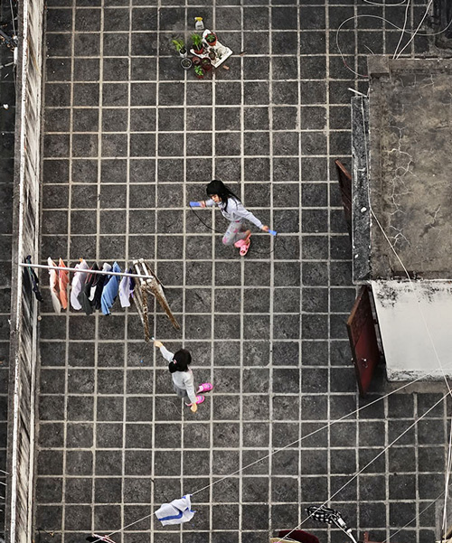 romain jacquet-lagrèze captures hong kong’s rooftops in new photo series