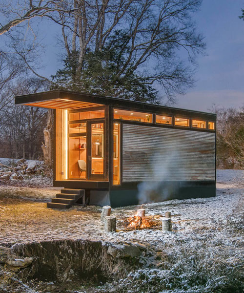 a tiny prefab cabin for cases of writer's block, designed for author cornelia funke