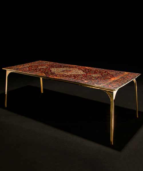 ruben van megen covers tabletops with old persian carpets for his café 6116 collection