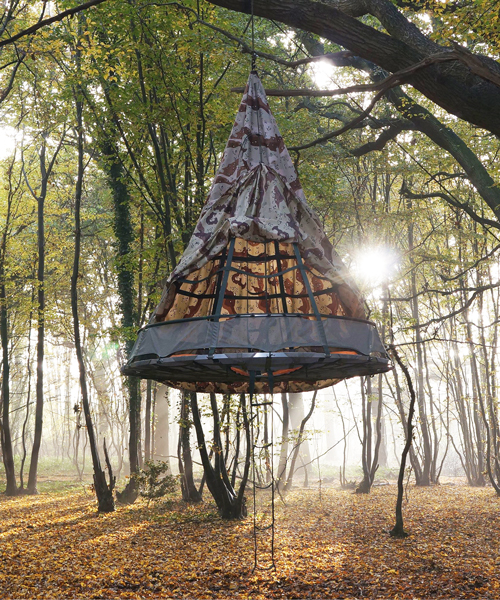 sky-pod, a spiderweb-like tent to hang in the woods