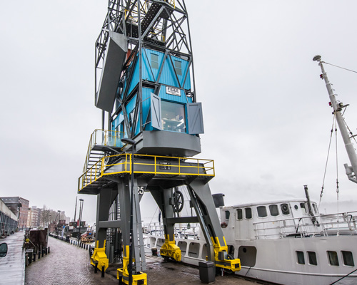 strange luxury, inside a hotel suite that's actually a dockyard crane
