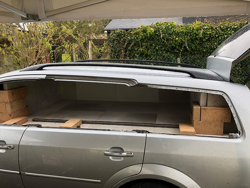 this old car was turned into a wood-burning pizza oven