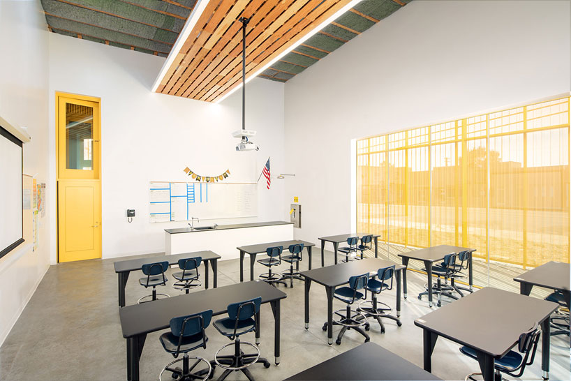 Brooks Scarpa Design Curved Yellow Charter School In South