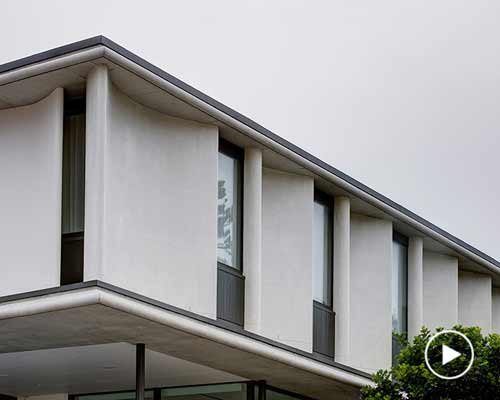 curved concrete and glass panels form residence in manly beach, australia