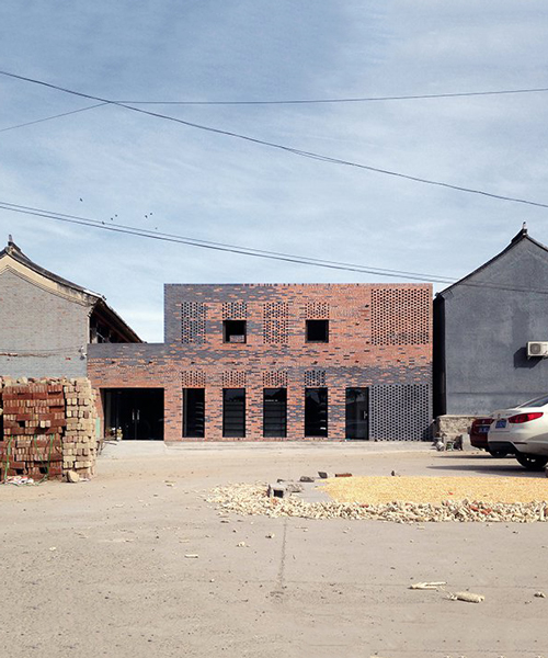 frédéric schnee creates patterns of different-colored bricks for the peach house in beijing