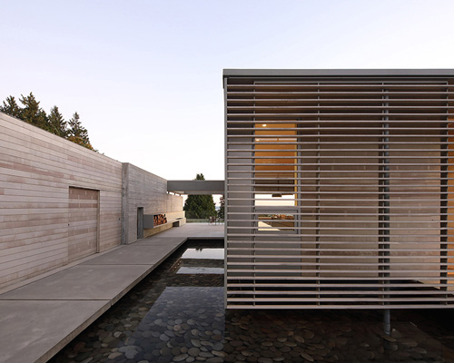 mcleod bovell wraps west vancouver residence in wood to resemble a beach house