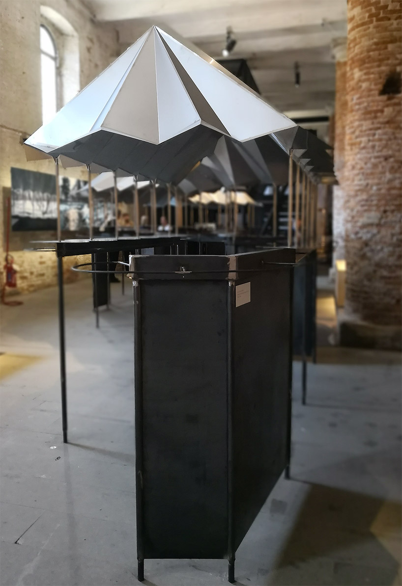 jensen & skodvin's protective roof over moya spring water source at venice biennale