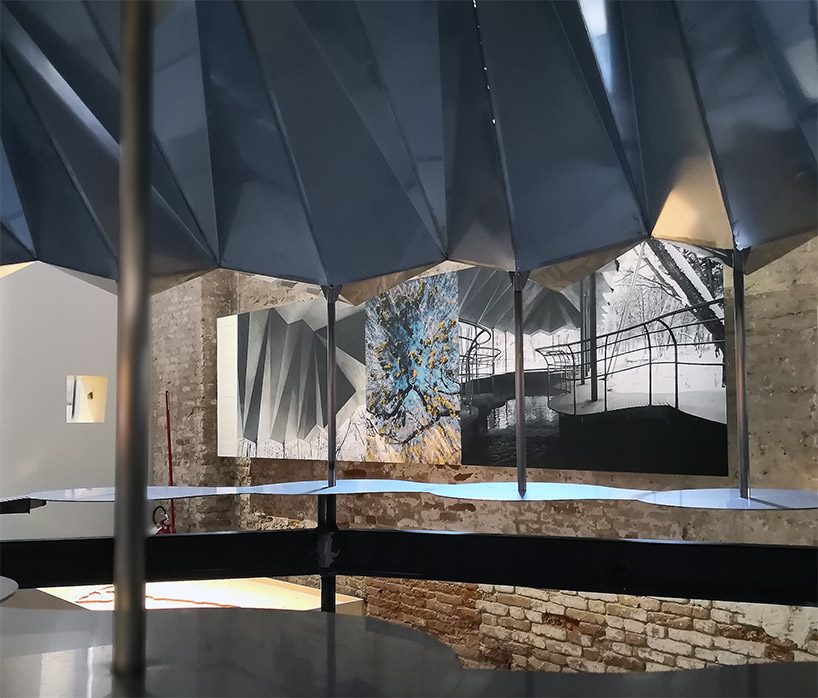 jensen & skodvin's protective roof over moya spring water source at venice biennale