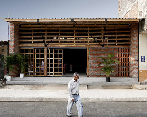 natura futura's 'the house of prayer' has a permeable façade made of wooden mesh