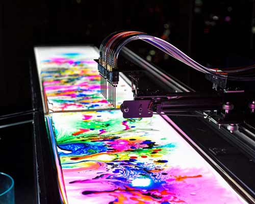 nor's dyebirth installation expresses birth, life, and death with colorful ink