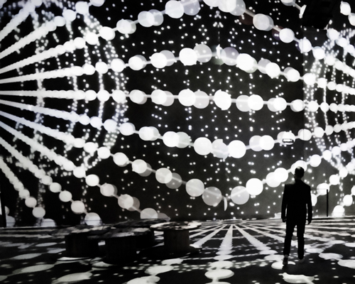 the world’s biggest AI exhibit required 136 projectors and 20 million lines of text