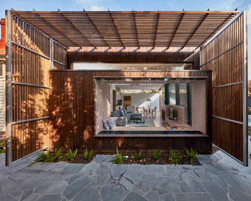warc studio's screen house in australia is cloaked in timber hardwood