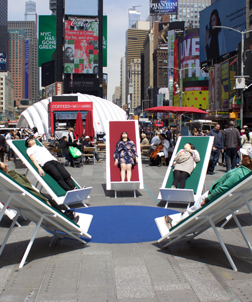 zU studio's parenthesis installation in times square brings love + peace to the world