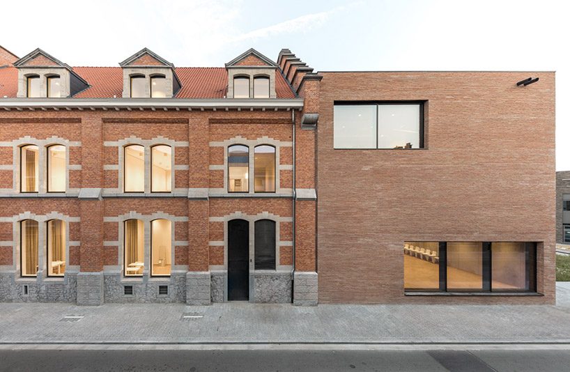 KAAN architecten completes 'utopia', a library and academy for performing arts in belgium