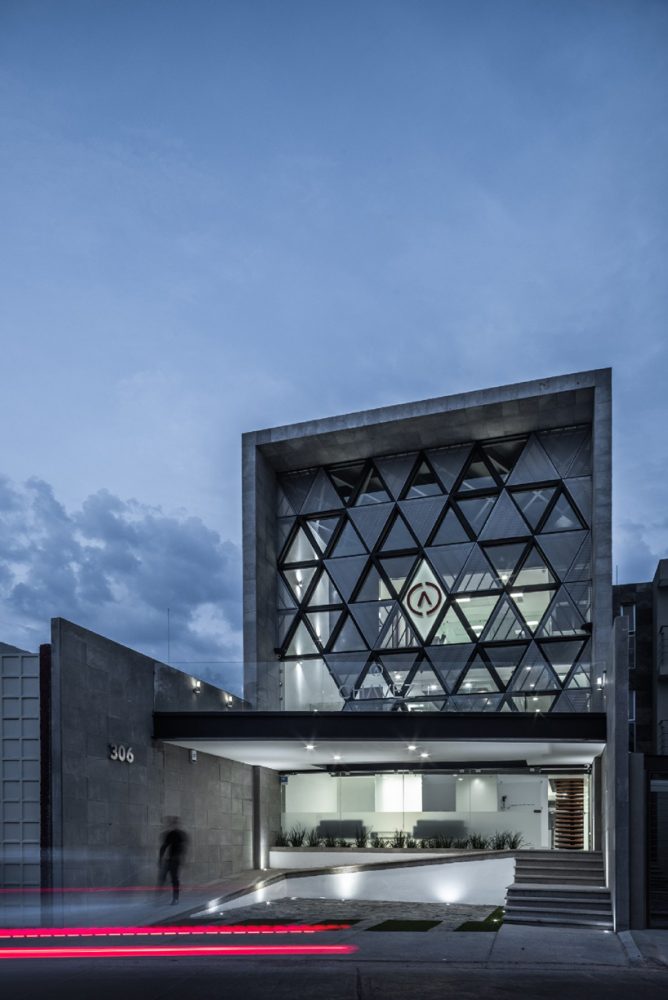 PLASTIK's mexican agency honors the company logo with its triangular pattern facade