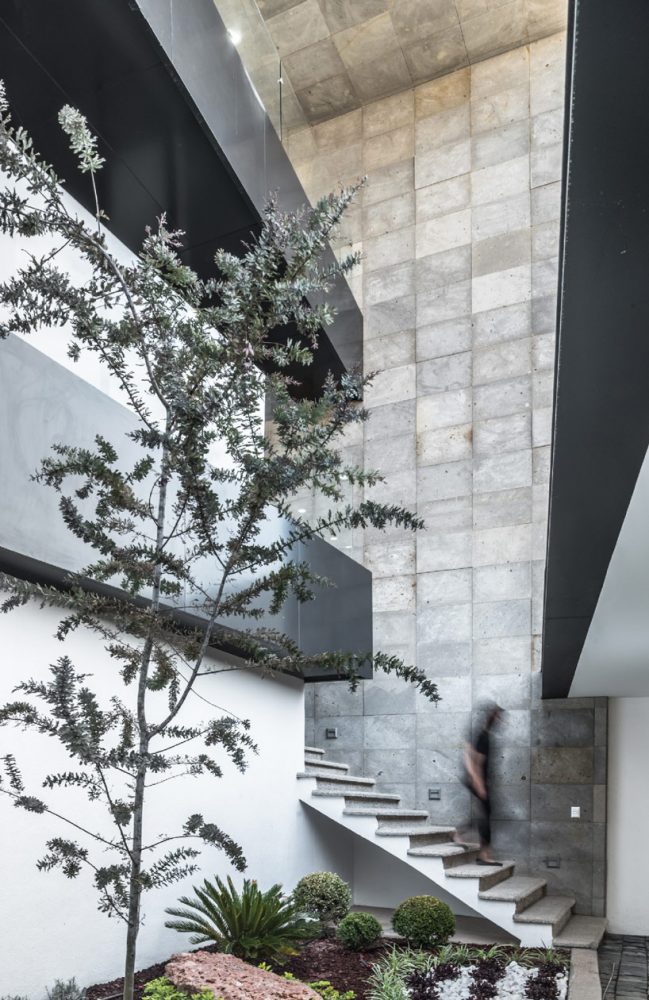 PLASTIK's mexican agency honors the company logo with its triangular pattern facade