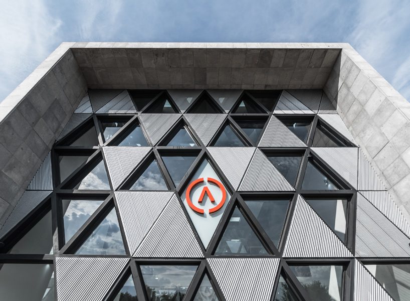 PLASTIK's mexican agency honors the company logo with its triangular pattern facade