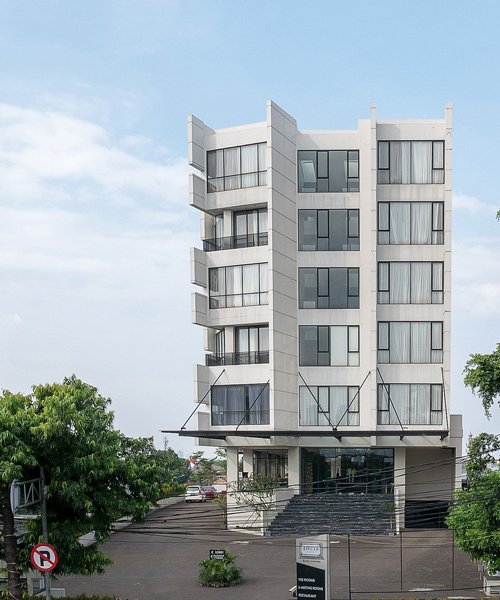 RAW architecture designs a wickering concrete rivoli hotel in the crowded east jakarta