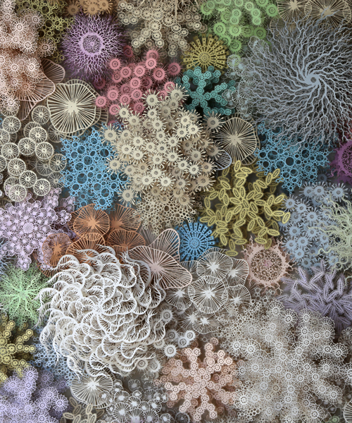artist reimagines the human microbiome as an intricately cut paper coral reef