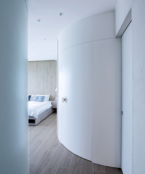 curvy volumes in bean buro's apartment renovation reference flowing water