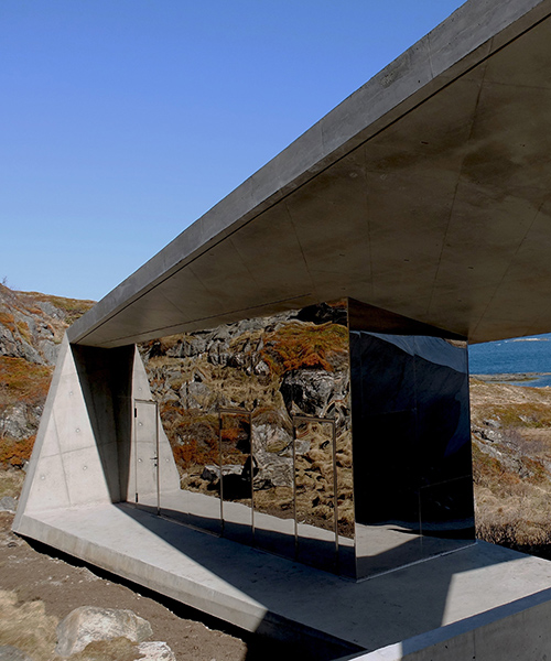 this delusive mirrored rest area welcomes travelers to the consecrated norwegian coastline