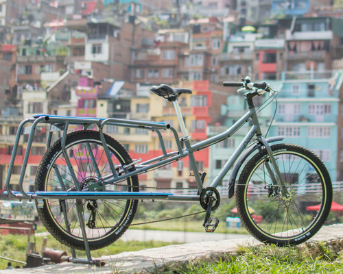 the portal bike is designed to carry up to 140 kg of cargo, plus its driver