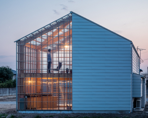 in central japan, a transparent solarium home designed for cultivating flora