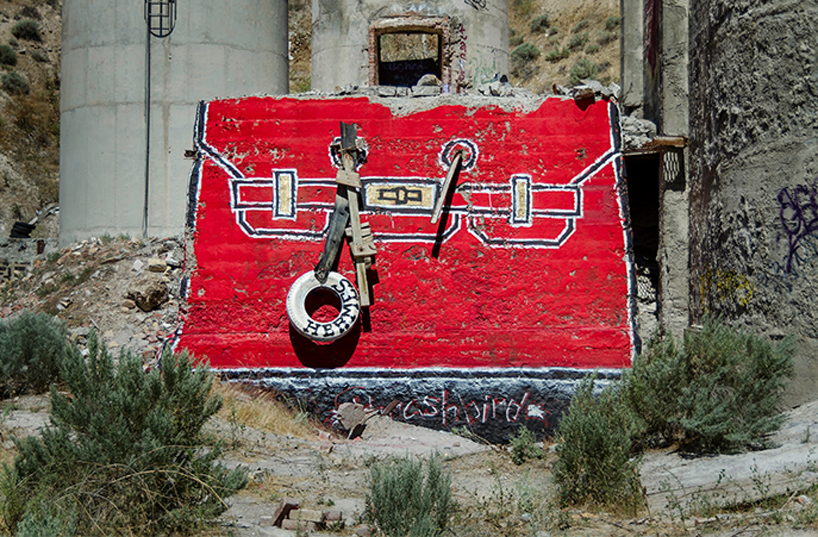 thrashbird turns concrete ruins in the desert into oversized luxury handbags