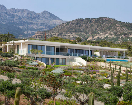 gerner gerner plus designs stone villa in crete with panoramic view to the libyan sea