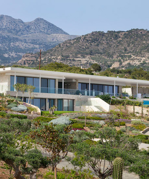 gerner gerner plus designs stone villa in crete with panoramic view to the libyan sea