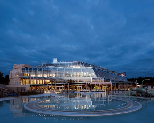 jacques ferrier's origami-shaped water park in france emerges as a built landscape