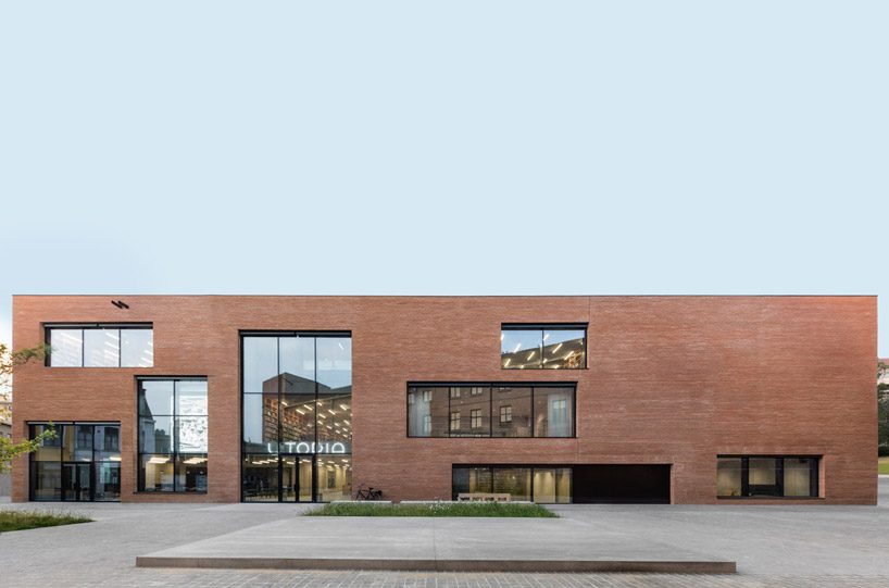 KAAN architecten completes 'utopia', a library and academy for performing arts in belgium