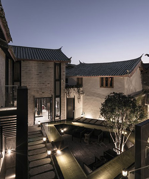 yiduan shanghai renovates an old chinese complex into a boutique hotel in yunnan province